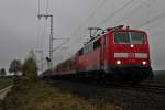 Einfahrt von 111 061 am 22.11.2013 mit der RB 26571 (Offenburg - Basel Bad Bf) in Müllheim (Baden) gen Süden.