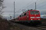 Mit einer RB am 14.02.2014 fuhr die Freiburger 111 064 aus dem Bahnhof von Müllheim (Baden) gen Basel.