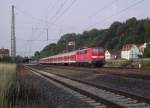 111 175-6 schiebt am 6. Juli 2011 eine Regionalbahn nach Bamberg in den Kronacher Bahnhof.