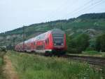 RE 4617/4789 nach Nrnberg ist am 12.Juli 2011 bei Thngersheim unterwegs.