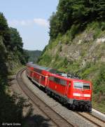 DB 111 223-4 schiebt RE 4254 Mnchen - Nrnberg, KBS 880 Passau - Nrnberg, fotografiert im Felsdurchbruch bei Deining am 26.07.2012  
