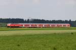 In der Ferne brllt der TB11 der 218 486-9 mit dem RE von Mnchen nach Memmingen kurz vor Buchloe am 07.07.2013