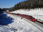 442 273-9 ist am 07. Februar 2015 als RE nach Nürnberg Hbf im Frankenwald bei Steinbach am Wald unterwegs.