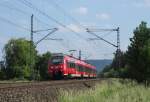442 310 ist am 07.Juni 2015 als RE 4990 nach Jena Saalbahnhof bei Stockheim(Oberfr) unterwegs.