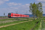 440 306/326 als RB 58124 Treuchtlingen-Würzburg bei Markt Berolzheim.