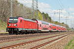 FEX mit 147 009 als FEX / RB 10 vom BER am 27. April 2022 durchfährt Diedersdorf.