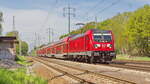 147 019 als FEX zum BER in Brandenburg am 11. Mai 2023 bei Diedersdorf.