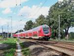 Im schnsten Sonnenschein des Spreewaldes beschleunigt der RE2 (RE 38169) aus Lbbenau/Spreewald herraus. Er kam aus Rathenow und fhrt weiter nach Cottbus ber Calau/Nl. Lbbenau/Spreewald den 13.08.2008 