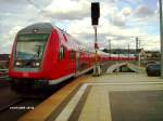 RE 1 nach Brandenburg Hbf bei der Einfahrt in Berlin Hbf am 19.07.2009, geschoben wird er von einer 114 032-6.