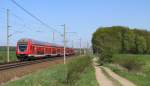 Ein RE1 nach Brandenburg Hbf in lndlicher Natur. Hier durchfhrt er Pillgram auf der KBS 201. 20.04.2011

