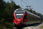 RE 9   Hanse Express   in Prora wieder anfahrend auf dem Wege nach Binz.
09.07.2014 14:52 Uhr.