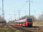 442 323 / 442 823 als RB 19  in Richtung Senftenberg  über Flughafen Berlin Schönefeld am 08.