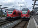 Treffen im Rostocker Hbf.rechts RE9 nach Sassnitz und links RE9 kurz nach der Ankunft aus Sassnitz im Rostocker Hbf.(09.05.09)