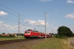 120 204-3 als RE 4312 von Rostock nach Hamburg bei der Einfahrt in den Bahnhof Brahlstorf. Fotografiert am 12.06.2015.