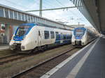 NationalExpress ET 855 mit RE 7 nach Krefeld Hbf neben ET 375 in Münster (Westf) Hbf, 15.11.2020.