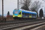 Der  Flirt  ET010 der Westfalenbahn rauscht zu seiner nachmittglichen Tour als RB61 von Bielefeld nach Bad Bentheim. Ein farbenfroher Lichtblick am sonst sehr grauen 11.02.2009. Hier kurz vor der Einfahrt zum Bhf Herford.