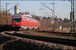 RB27 (RB 12570)  Rhein-Erft-Bahn , von Koblenz Hbf nach Kln Hbf, fhrt bei Feldkrichen Richtung Kln. Schiebelok ist die 143 637.(09.02.2008)