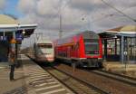 ICE 791 (Kiel Hbf - Leipzig Hbf) und RE 17688 (Leipzig Hbf - Magdeburg Hbf), am 20.02.2012 in Delitzsch unt Bf.