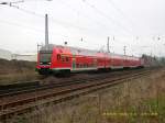 Der RE von Leipzig Hbf nach Magdeburg Hbf rauscht am 11.04.08 durch den Bahnhof Raguhn. Hinten schiebt eine 143er.