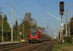 Ein RE nach Hamburg Hbf durchfhrt am 25.10.2008 den Haltepunkt Kupfermhle.