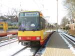 Tw 504 (Hier im Vordergrund und von hinten gesehen) und der vordere Tw 578 fuhren am 07.03.2010 als S1 von Bad Herrenalb nach Karlsruhe-Neureut. Das  Paar  fhrt gerade aus dem Ettlinger Stadtbahnhof aus. Links im Bild zu sehen ist der Tw 560, der ber dem vorderen Zielrollband (leider auf dem Bild nicht zu sehen) ein Gert (vom KIT) zur Messung der Luftqualitt besitzt.