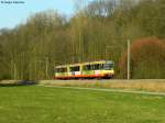 22.03.2011: Wagen 811 mit Werbung von Volkswohnung auf dem Weg von Menzingen nach Karlsruhe Hbf.