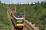 Die S11 unterwegs nach Ittersbach. Im Hintergrund Karlsruhe/Neureut (10.6.2012)