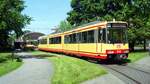 AVG Albtalbahn__Vor der Halle des Albtalbahnhofs: ‘S’ Sonderzug Tw 818 hat als DB-eigenes Fahrzeug auch die passende Nummerierung: 450 002-1. [GT8-100C/2S; 1994 DUEWAG/ABB; 2001 durch Brand zerst�rt;2002+]__31-05-1994