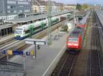 146 116-9 mit einem RE nach Basel Bad. Bf und vier BSB RS1 Richtung Breisach stehen im Freiburger Hbf. 12.11.08 