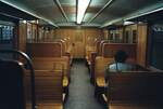 Nur eine einzige Frau saß verlassen im Wagen einer S-Bahn von Berlin (Wagen der früheren DRG Baureihe ET 165) noch zu DDR-Zeiten (Datum unbekannt)