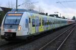 Der Triebwagen 430 140 am 24.03.2024 als Werbetr�ger f�r das  Deutschland-Ticket  als f�hrendes Fahrzeug in einem Langzug auf der S1 im Bahnhof Rodgau Nieder-Roden