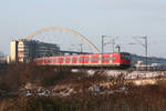 Im Morgenrot wurde dieser Zug der Linie S 6 zwischen Köln Messe / Deutz und Köln-Buchforst fotografiert.