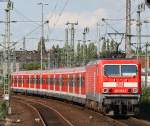 143 604-7 schiebt ihre S5/S8 nach Dortmund, hier bei der Ausfahrt in Dsseldorf Hbf 28.7.09