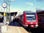 422 055/555 und 422 005/505 stehen gemeinsam in Neuss Hbf als S8 und warten auf Gleis 7 da in Gleis 8 der RE13 berholt. 07.03.10