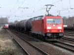 185 317-5 mit GZ, links hat die S 6 (Kln-Nippes-Essen Hbf) soeben Dsseldorf-Rath verlassen. 12.03.2011.