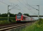 422 524-9 als S8 nach Mönchengladbach in Kleinenbroich am Friedhof. 1.8.2014