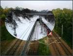 Sommer und Winter -    S-Bahntunnel-Einfahrt kurz hinter der Station Österfeld in Stuttgart-Vaihingen.