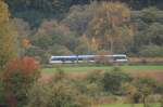 Unbekannter Stadtbahnwagen der Saarbrcker Verkehrsgesellschaft Saarbahn&Bus auf der Linie 1 Richtung Kleinblittersdorf zwischen den Haltestellen  Bbingen  und  Kleinblittersdorf Bahnhof  auf dem Netz des Deutschen Bahn in  freier Wildbahn  - aufgenommen aus etwa 1km Entfernung mit 300mm Brennweite (08.10.2008).