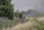 Am 26.06.2011 war 99 574 mit einen Personenzug nach Mgeln untewegs. Hier dampft sie gerade durch das Ortsgebiet von Schweta.