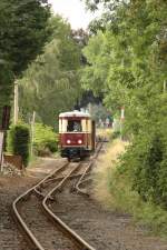 VT 137 322 im Oschatz Stadtgebiet, gerade hat er das Ende des ehemaligen Dreischienengleis in Richtung Mgeln erreicht.