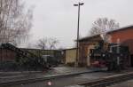 Dllnitzbahn 99 1574-5 am 02.01.2012 beim Wasserfassen Bw Mgeln. Im Rahmen der  Glhweinfahrten  an dem Tag, war ein Foto von dem Standort aus erlaubt.