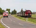 Anlsslich des Oschatzer Trucker-Treffens fand eine Parallelfahrt mit der Dllnitzbahn und den teilnehmenden LKW's statt.