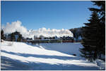 Bei herrlichem Winterwetter, fuhr die VIIK 99 1773 der Fichtelbergbahn, von Cranzahl nach Kurort Oberwiesenthal, aufgenommen nahe Unterwiesenthal.