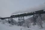 Die Freitaler 99 771 ist derzeit als Ersatz fr schadhafte 99 786 auf der Fichtelbergbahn unterwegs. Hier dampft sie am 22.01.2010 ber das Obererwiesenthaler Viadukt.