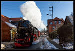 Wo die Dampflok noch durch´s Wohnzimmer fährt - Lok 99 7237 der HSB mit Zug 8933, von Wernigerode zum Brocken, aufgenommen nahe der Hochschule Wernigerode. 
4.3.2013