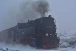 99 7247-2 schnauft den Brocken hoch und erreicht in Kürze den Brockenbahnhof.

Brocken 06.01.2020