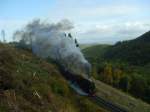 Zug 8941 schnaufend aus dem Tunnel kommend fhrt hinauf nach Drei Annen Hohne und weiter zum Brocken. An dieser Stelle entstand scheinbar ein neuer Fotopunkt durch die Rodung des Waldes an jener Stelle. 4.10.2008 11:20