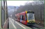 Nordhuser Tram 202 auf den Geleisen der HSB in Illfeld. (06.12.2009)