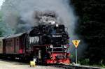 99 7243-1 der Harzquerbahn bei Ausfahrt aus 3 Annnen Hohne am 09.07.2011