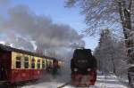 99 7245 mit Sonderzug  Quedlinburger Brockenexpress  am 26.01.2013 abfahrbereit im Bahnhof Drei Annen Hohne. Sie wird in Krze den am Bahnsteig nebenan stehenden P8941 auf den Brocken folgen.